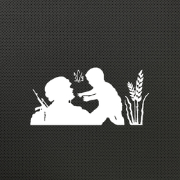 Soldier holding a baby