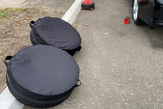 Spare wheel cover and tire storage sets